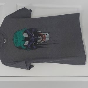 DC Comics tshirt. The Joker with a Batman mask.